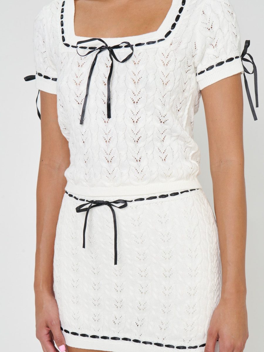 Sim Top ~ Ivory Knit With Black Trim