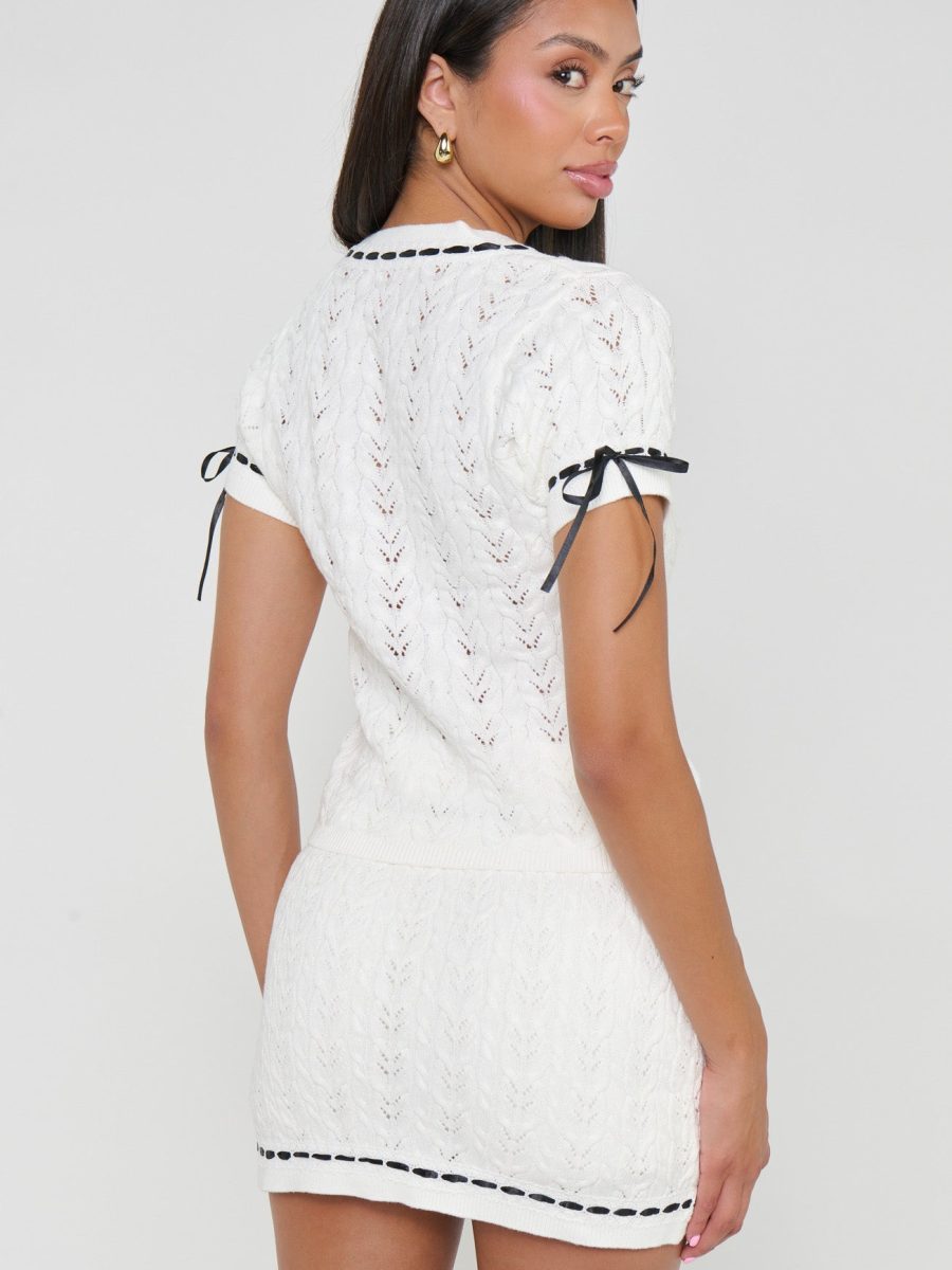 Sim Top ~ Ivory Knit With Black Trim